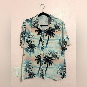Women’s size small button up Hawaiian shirt.